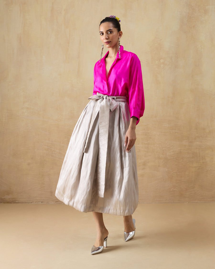 The Boxy Shirt tucked into the Prance Skirt with silver heels.