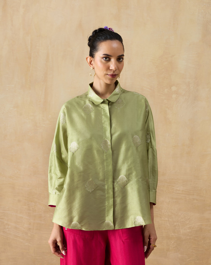 The Boxy Shirt buttoned to the collar.