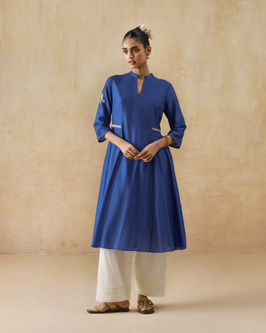 The Moonsong Kurta worn over ivory Numa Pants.