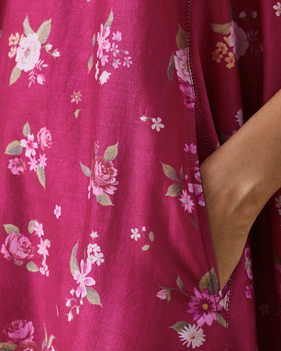 Close-up of the Berry Guldasta rose print on the Lumen Dress.