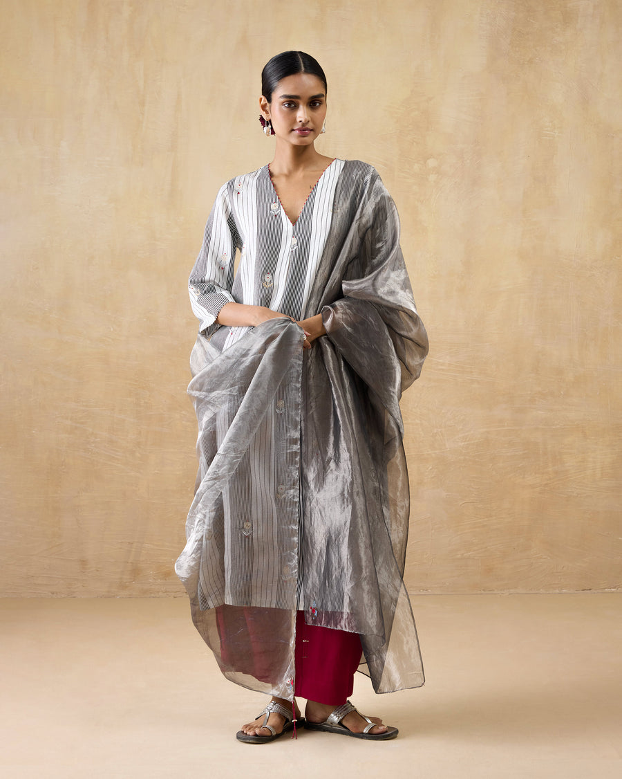 The Aluva Dupatta worn over the Dash Kurta and red Basic Pyjama.