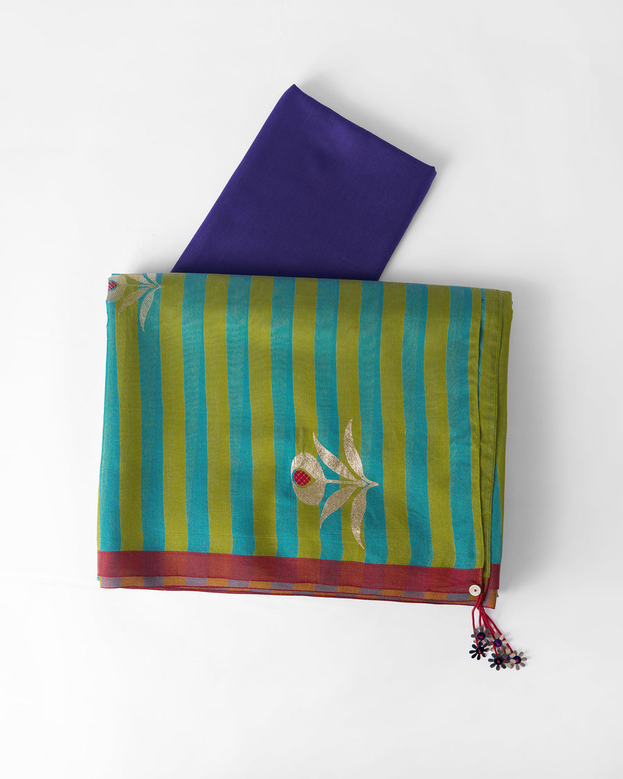 The Garden Party Sari folded flat with its blouse piece, showing the stripes, a foil motif and the red border.