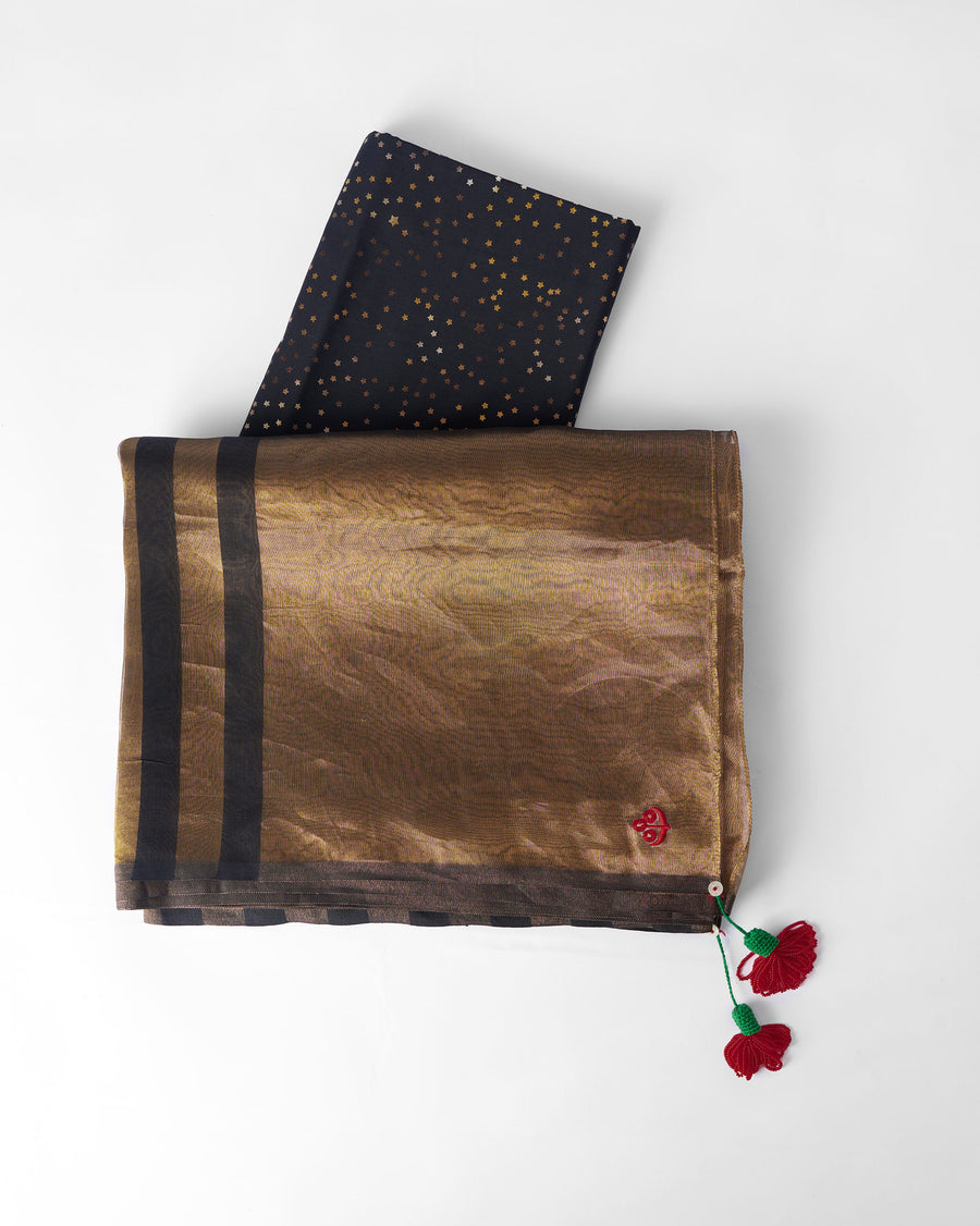 The Dancefloor Sari folded flat with its black sequin blouse piece.