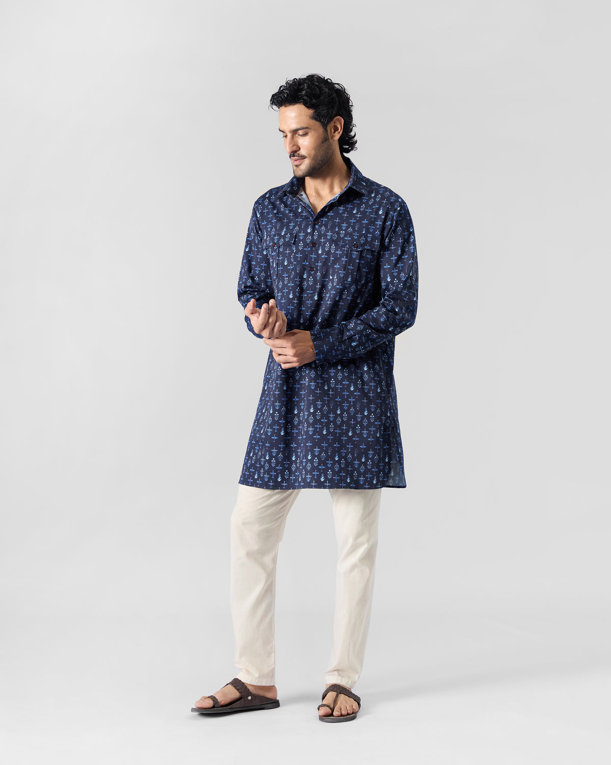 Full-length view of a dark blue Hawai Sa Kurta worn by a person.