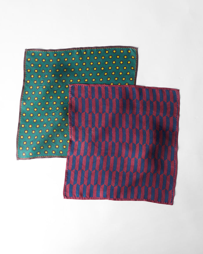 Pair of multicolour Drongo silk pocket squares laid flat.