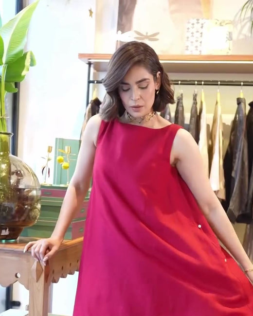 Roohi Marjara in the red Double Layer Dress with the Indus Necklace and sneakers
