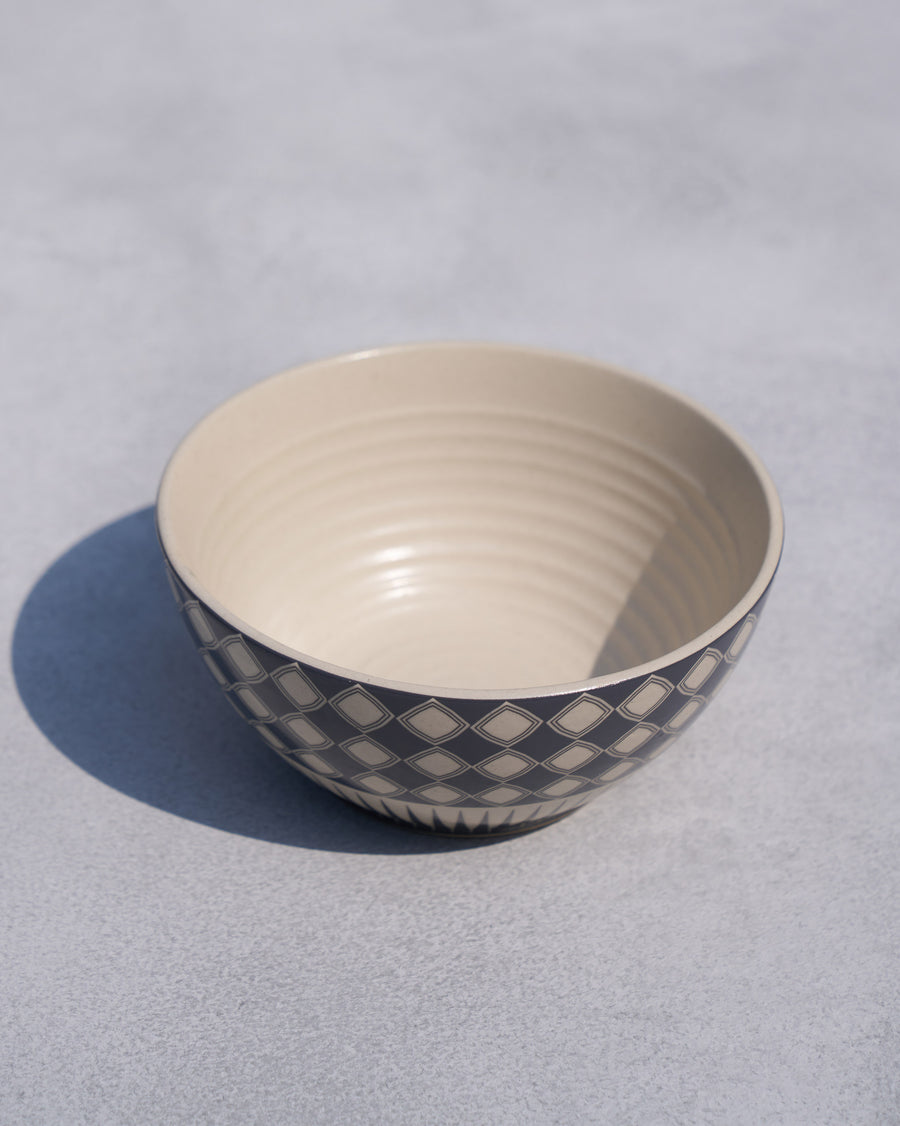 The Fez Cereal Bowl showing its cream interior.