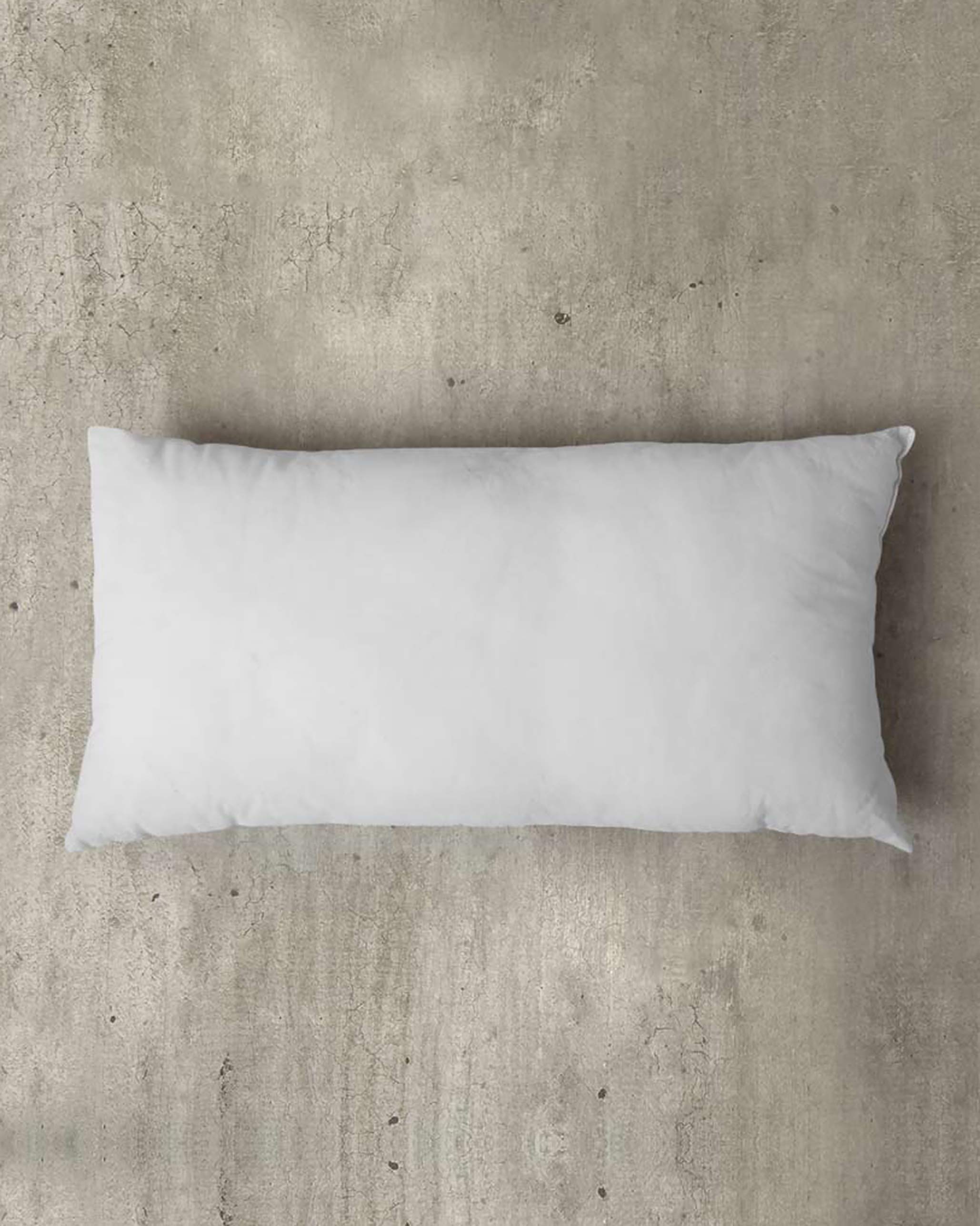 https://www.nicobar.com/cdn/shop/products/1519117492NBI001409_F5_Cushions_Pillow-Filler-36-x-66-cm_pdp_Dec_2015_v1_A46A9544_5c13ee20-9cae-4957-b83a-b880cbb1700d.jpg?v=1612970942