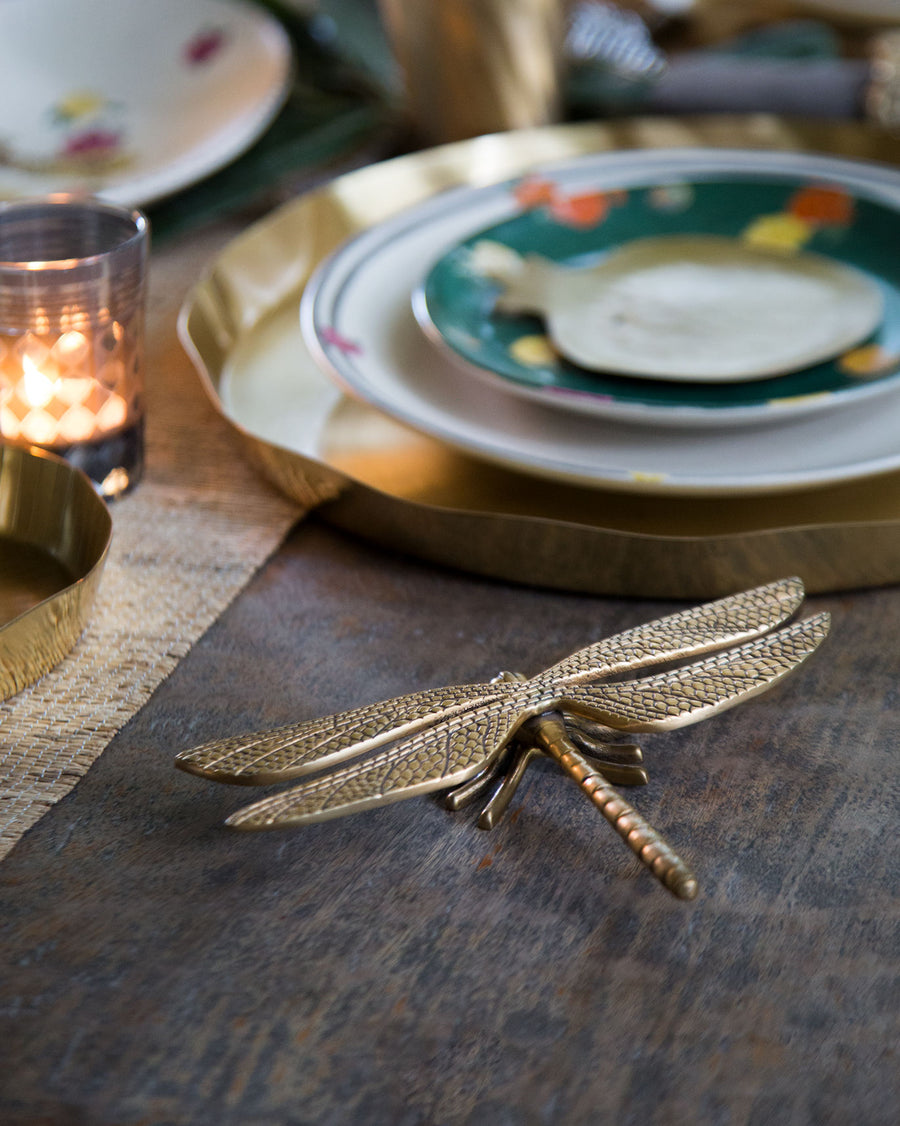 The Dragonfly Accent Piece styled on a dining table.