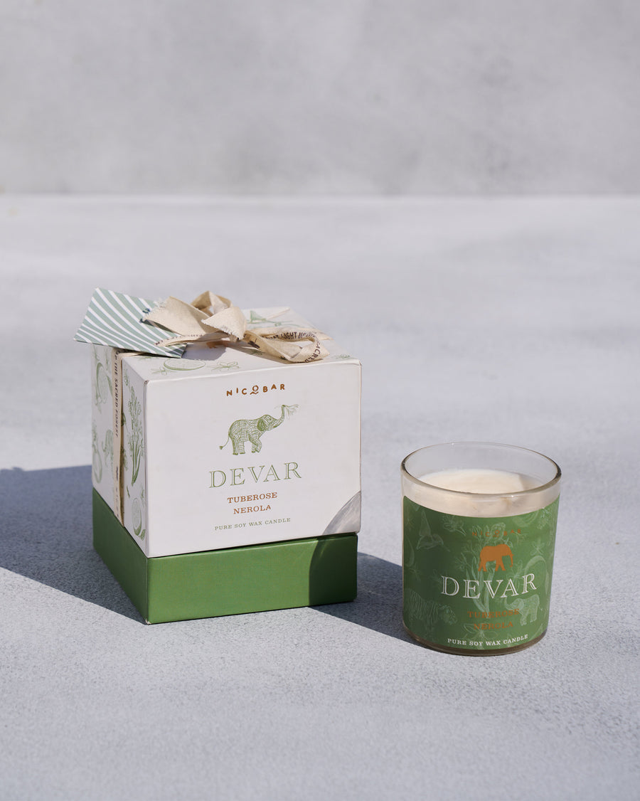 The Devar Candle beside its gift box.