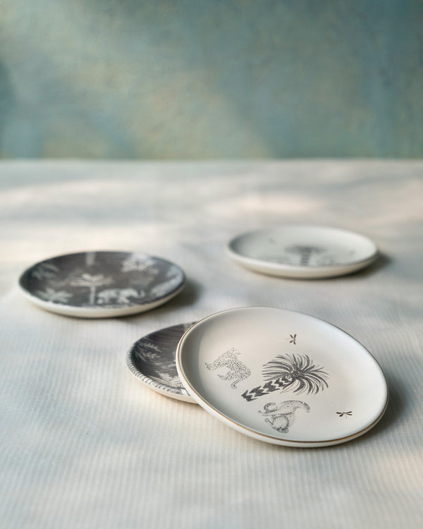 Plates scattered on a soft surface