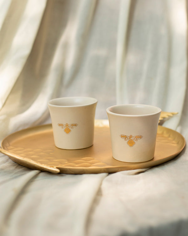 The pair on a gold tray