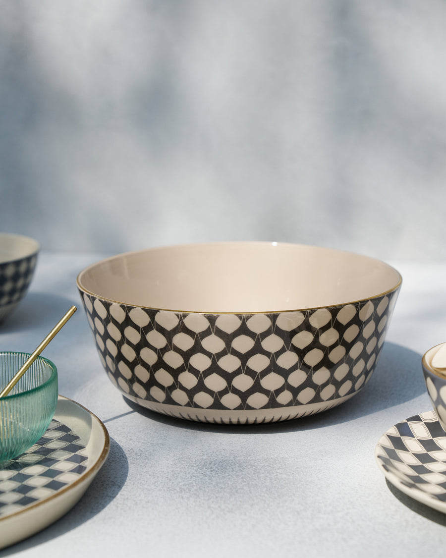 The Fez Curry Bowl styled among matching plates.