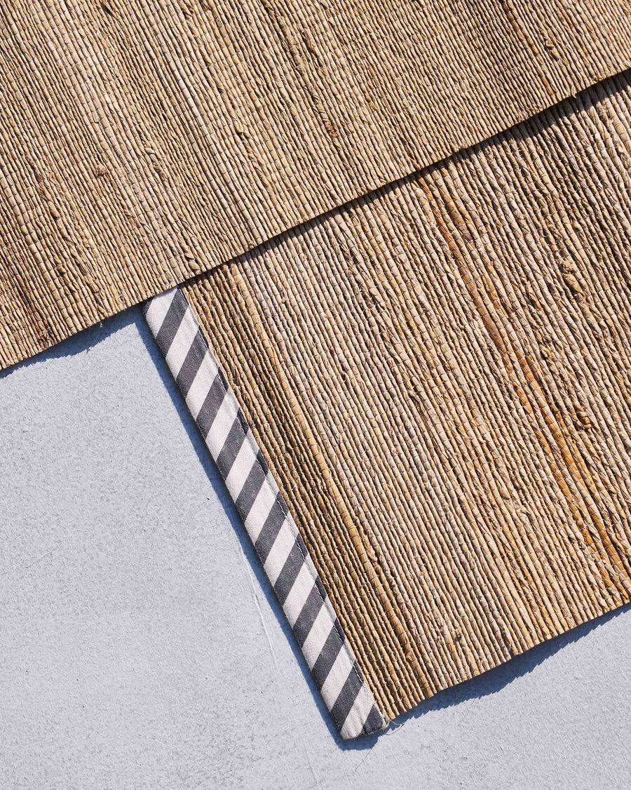 The woven placemats close up.