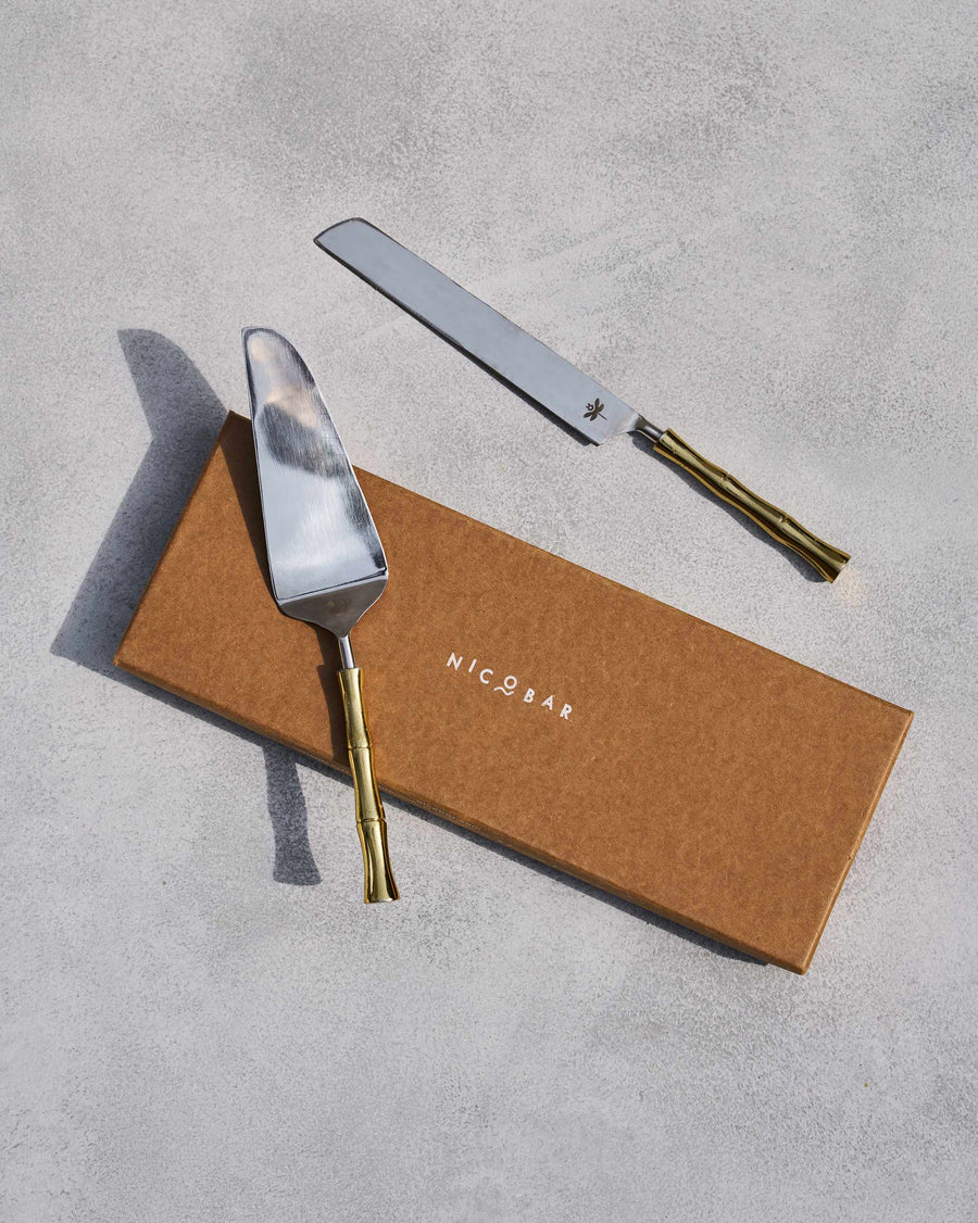 The cake knife and server on their Nicobar box.