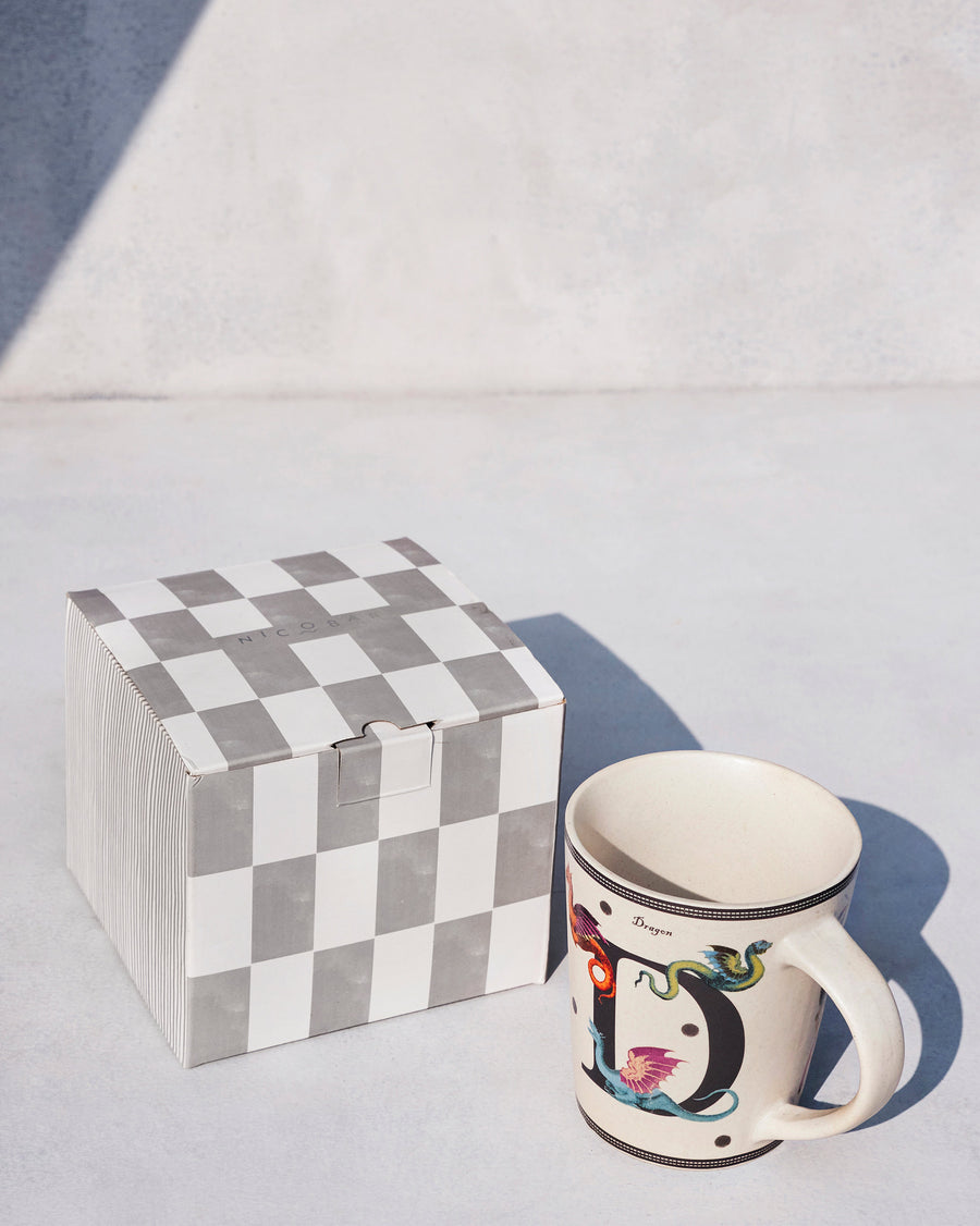 The Dariya Mug beside its chequered Nicobar gift box.