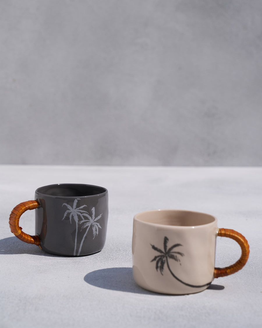 The pair of Mandovi Mugs in charcoal and ivory.