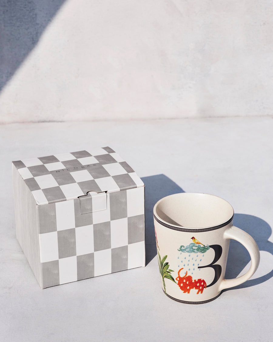 The Badal Mug beside its chequered Nicobar gift box.